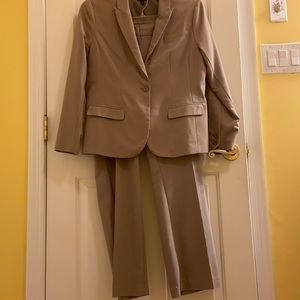 Two piece tan woman’s suit